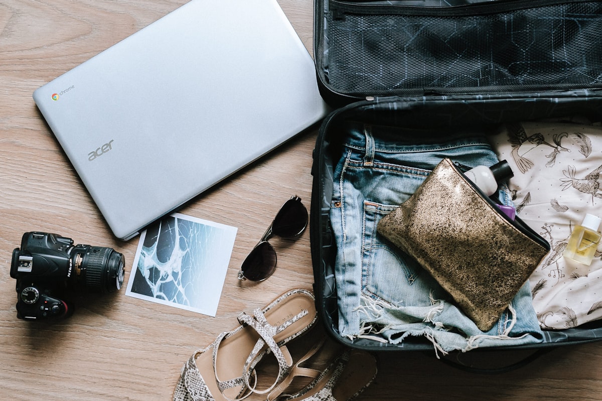 Organized packing cubes arranged neatly inside an open carry-on suitcase
