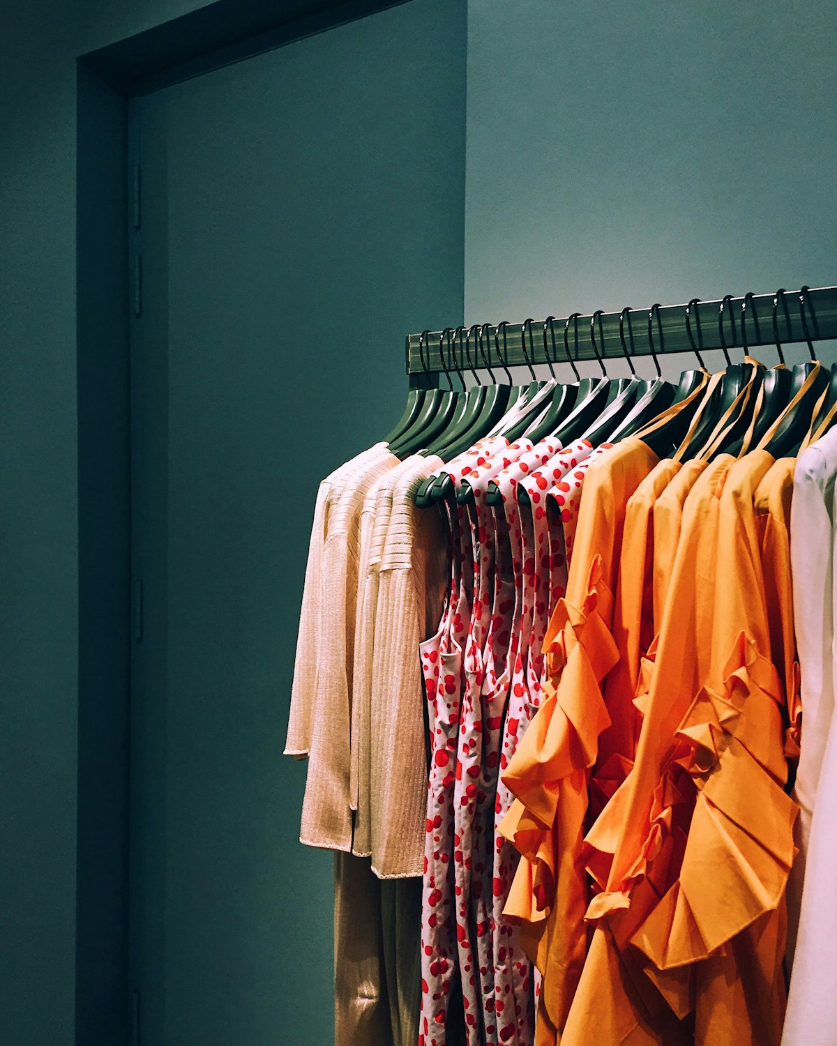 Handbag, shoes, and jewelry styled as wardrobe accessory essentials